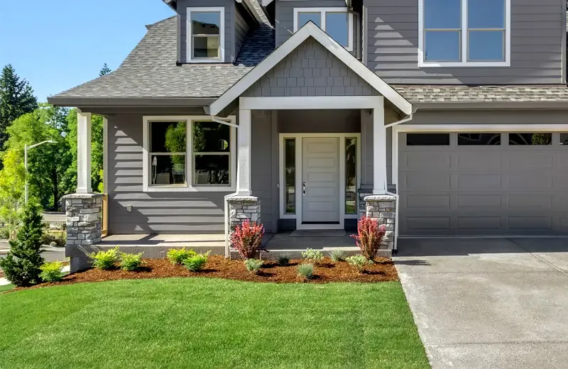 nice house with green front lawn